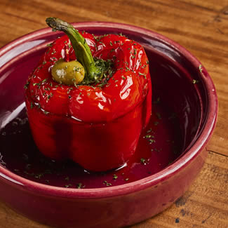 Stuffed red pepper served at El Pimiento Restaurant in Miami Lakes, representing traditional Spanish flavors